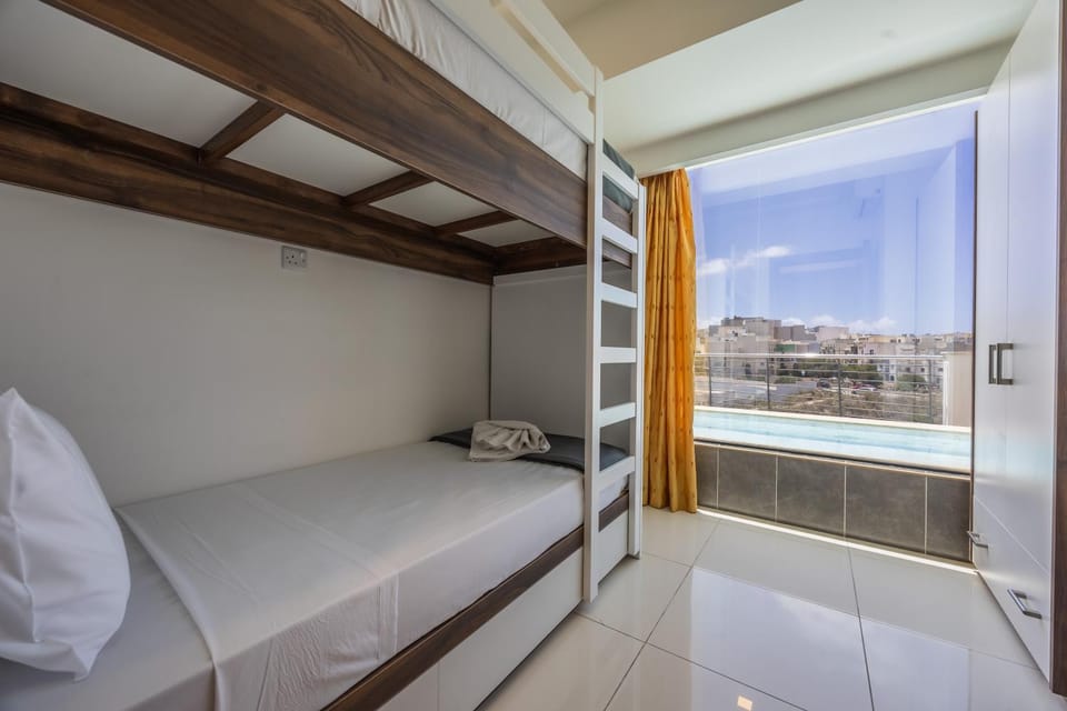 Mellieha Penthouse with pool and view by Homely Apartment in Malta