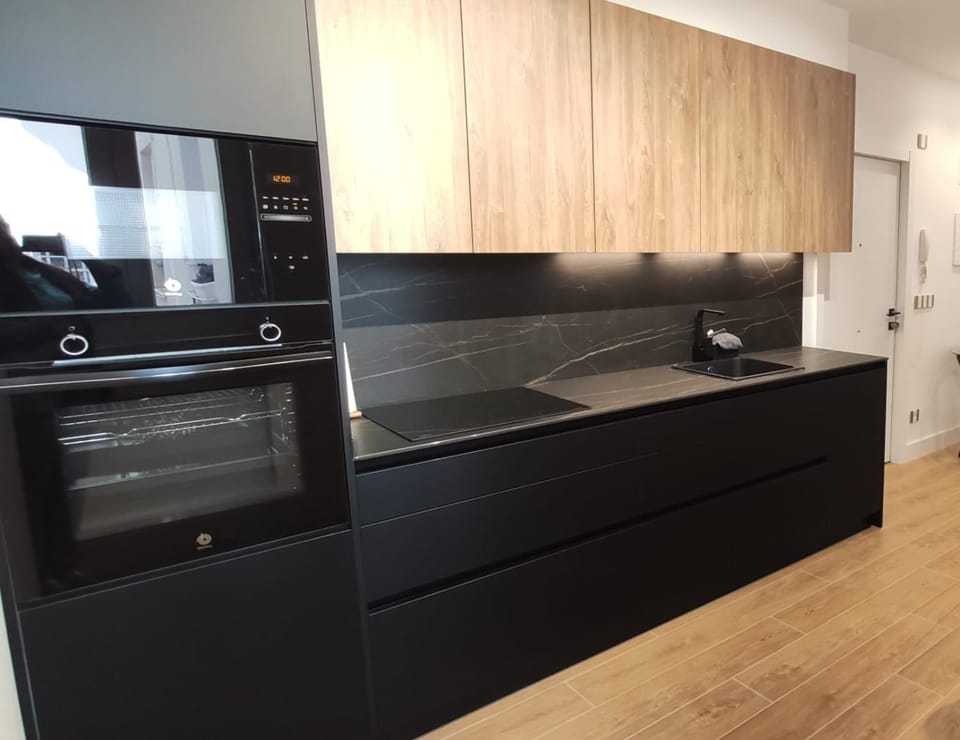 Kitchen or kitchenette, microwave, oven, stove