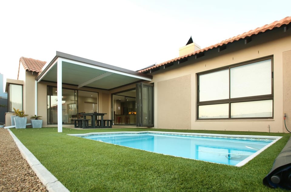 Property building, BBQ facilities, Garden, Swimming pool