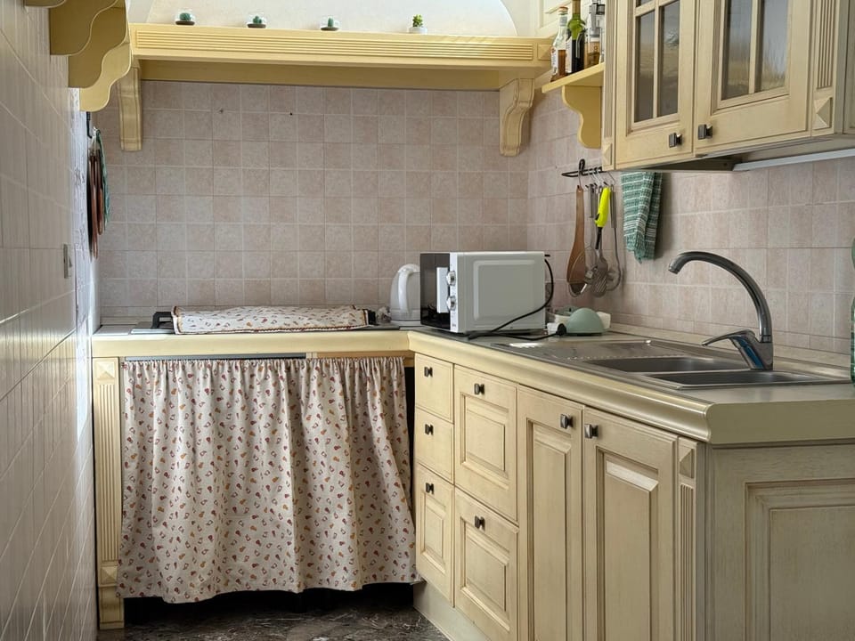 Kitchen or kitchenette, stove