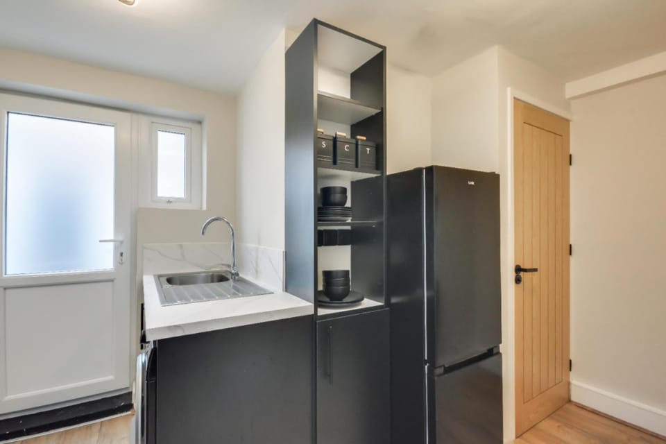 Kitchen or kitchenette, oven, stove