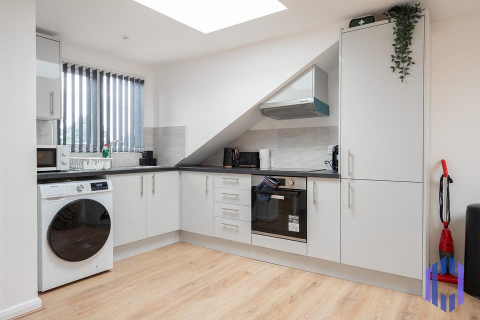 Property building, Kitchen or kitchenette, oven, stove, washing machine