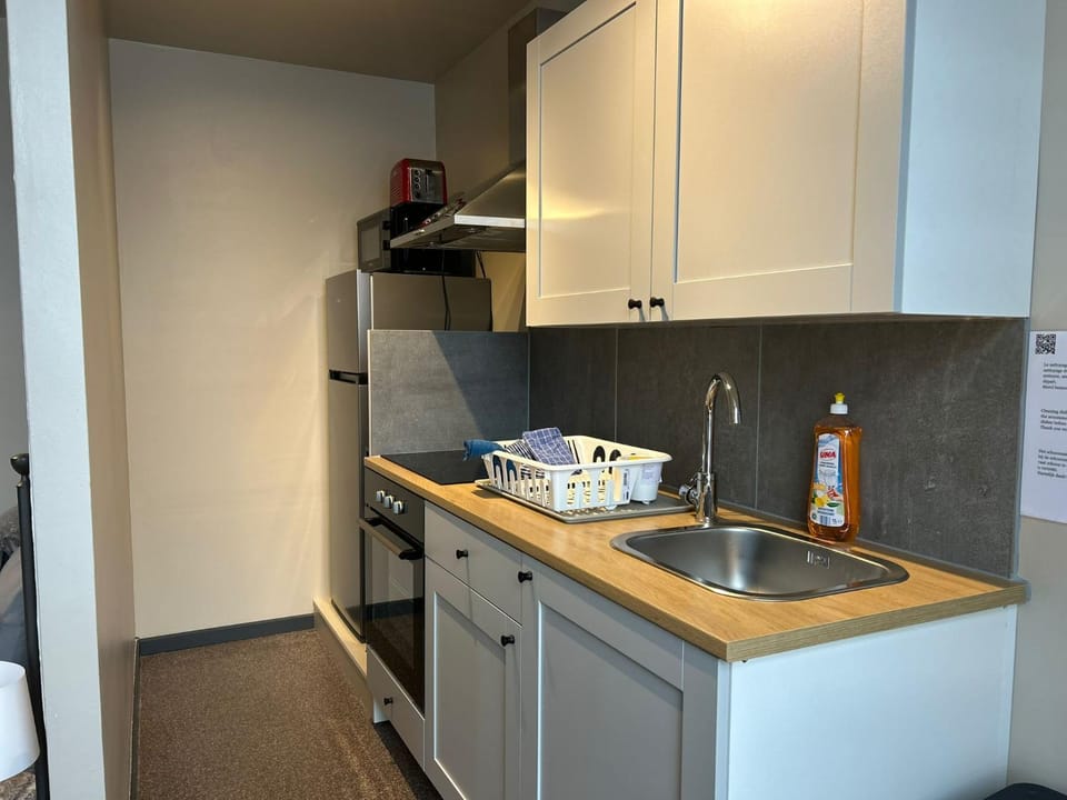 Kitchen or kitchenette, toaster, wardrobe