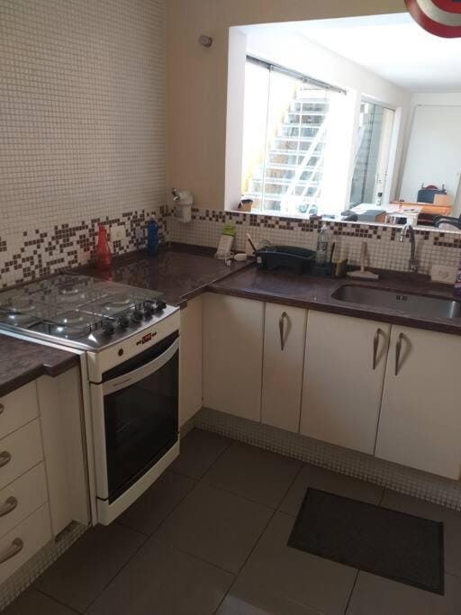 Kitchen or kitchenette, stove
