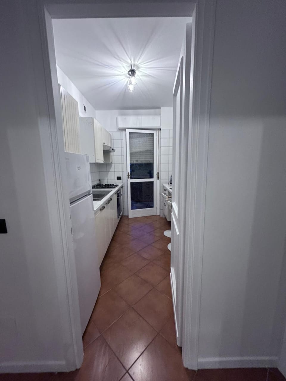 Kitchen or kitchenette, stove
