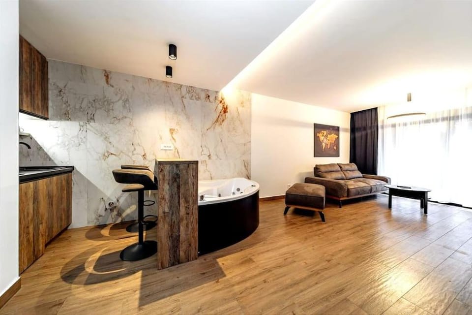 Bed, TV and multimedia, Kitchen or kitchenette, Living room, Photo of the whole room, Seating area, Bedroom