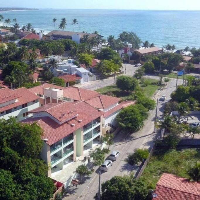 Property building, Day, Neighbourhood, Natural landscape, Beach, City view, Sea view, Street view, Location