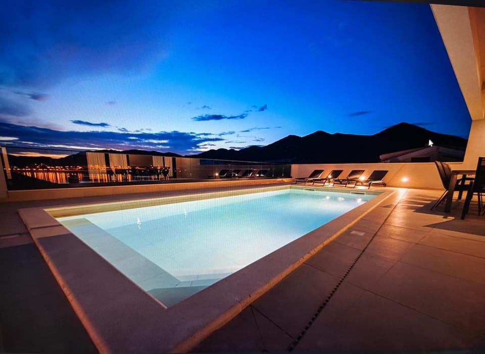 Patio, Natural landscape, Pool view, Swimming pool, sunbed