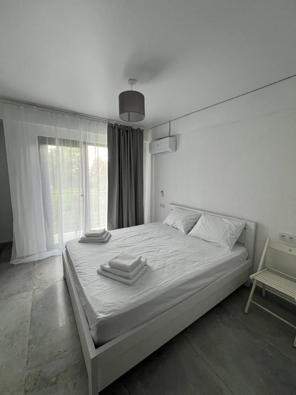 Bed, Photo of the whole room, Bedroom, towels, air conditioner