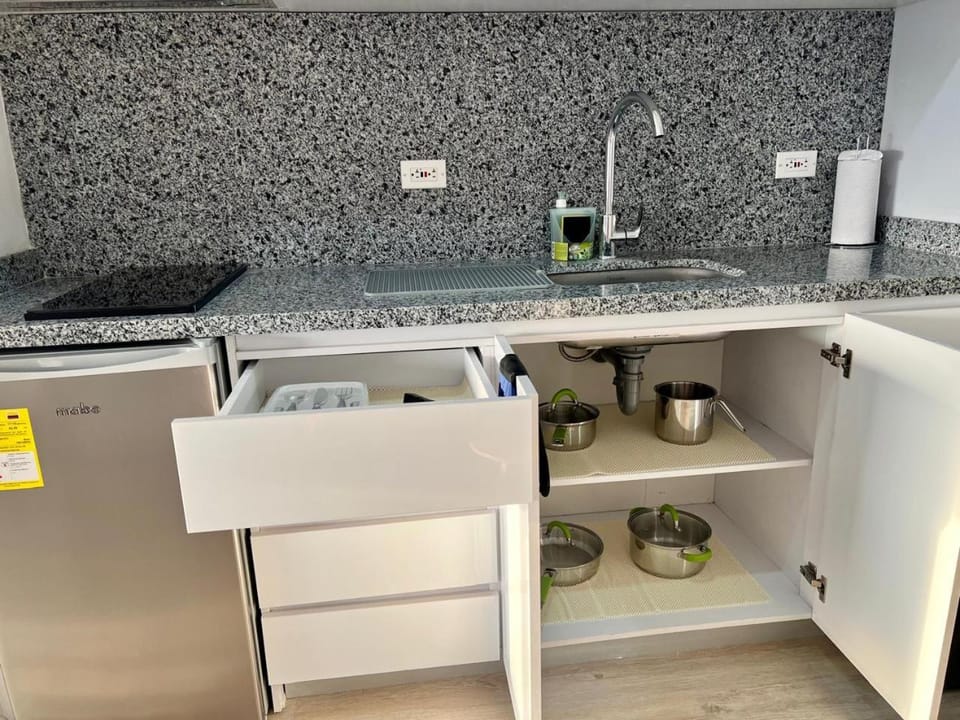Kitchen or kitchenette, stove
