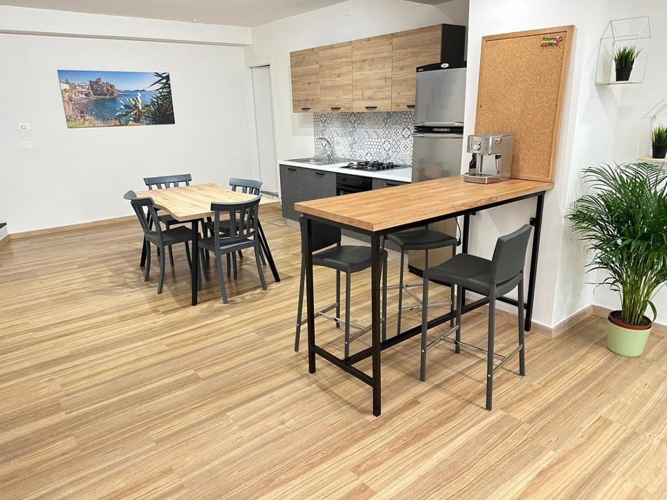 Kitchen or kitchenette, stove, air conditioner