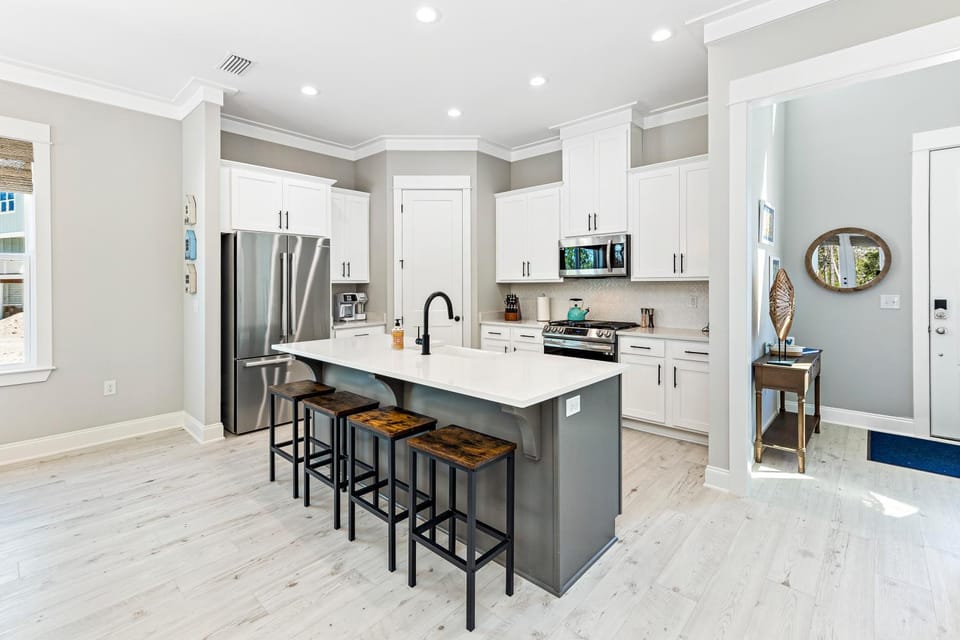 Kitchen or kitchenette, dishwasher, oven, stove