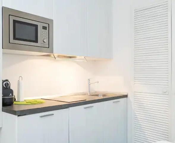 Kitchen or kitchenette, stove