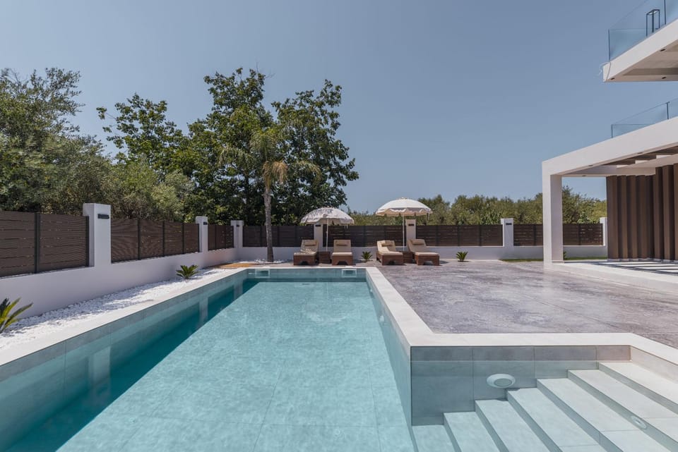 Patio, Day, Pool view, Swimming pool, sunbed