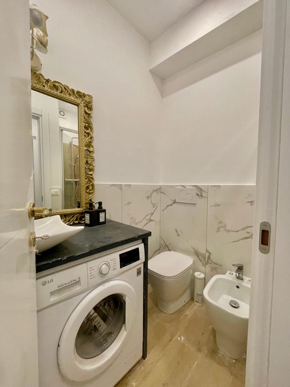 Bathroom, bidet, washing machine