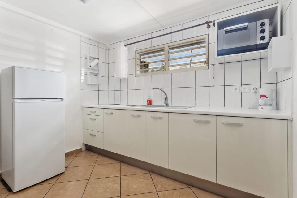 Kitchen or kitchenette, stove