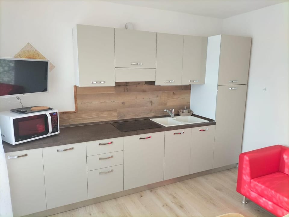 Kitchen or kitchenette, stove