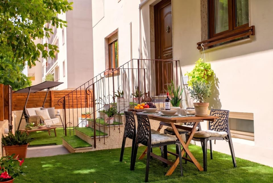 Property building, Patio, Garden, Seating area, Dining area, Garden view