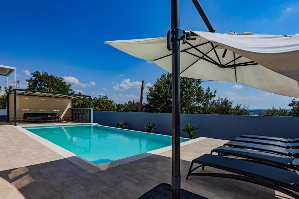Patio, Day, Pool view, Swimming pool, sunbed