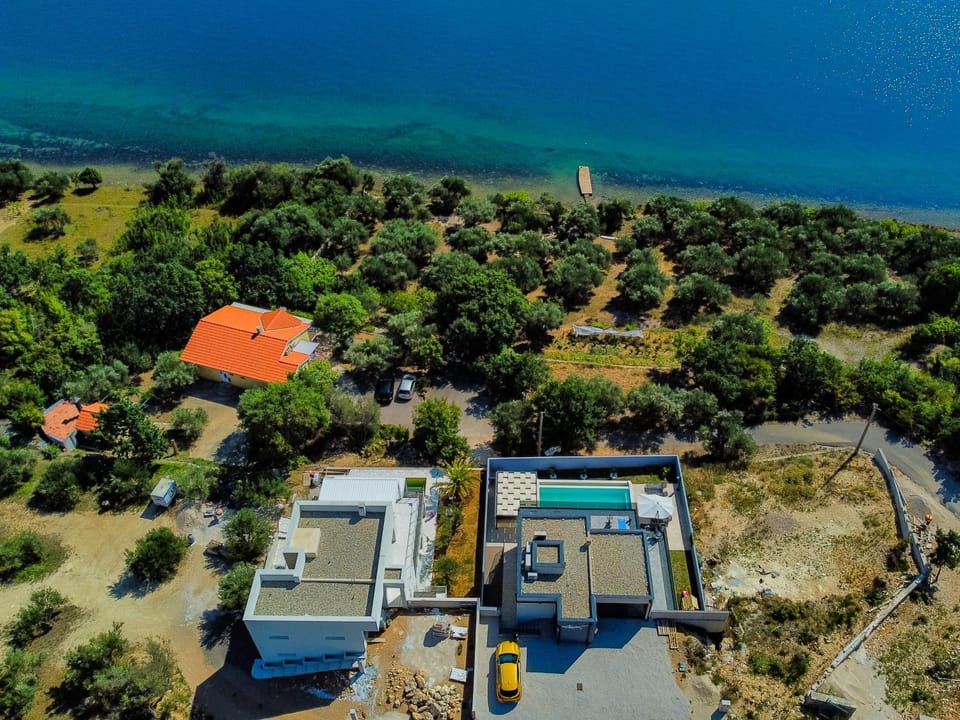 Property building, Natural landscape, Bird's eye view, Pool view, Sea view, Swimming pool