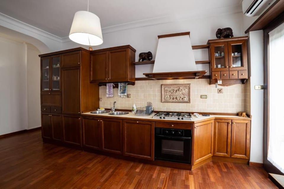 Kitchen or kitchenette, dishwasher, oven, stove