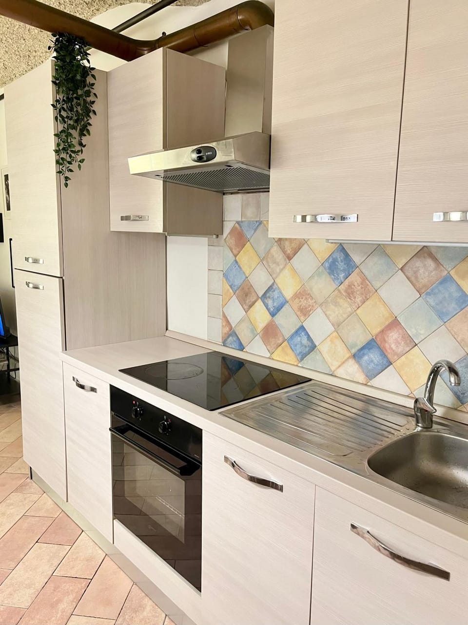 Kitchen or kitchenette, oven
