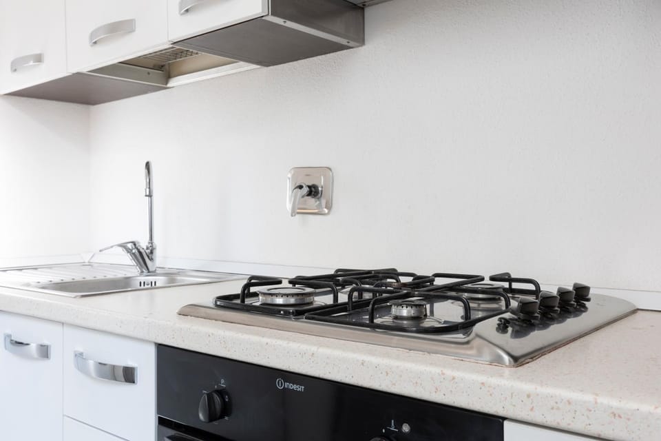 Kitchen or kitchenette, stove