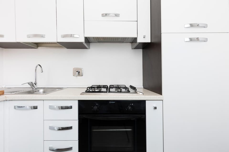 Kitchen or kitchenette, stove