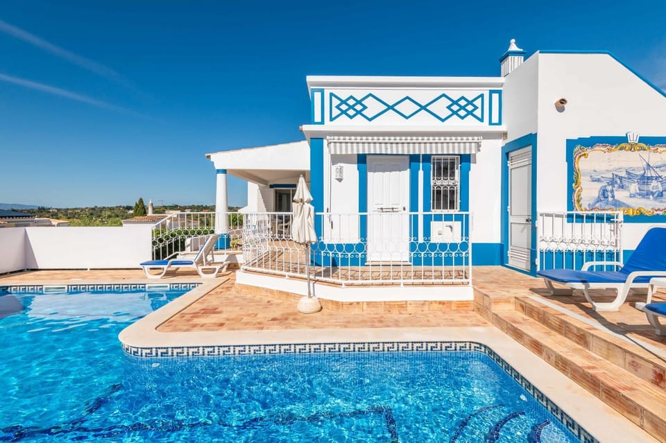 Property building, Living room, Swimming pool
