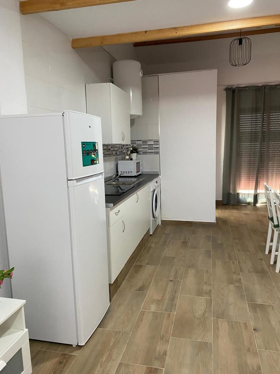 Kitchen or kitchenette, dishwasher, stove