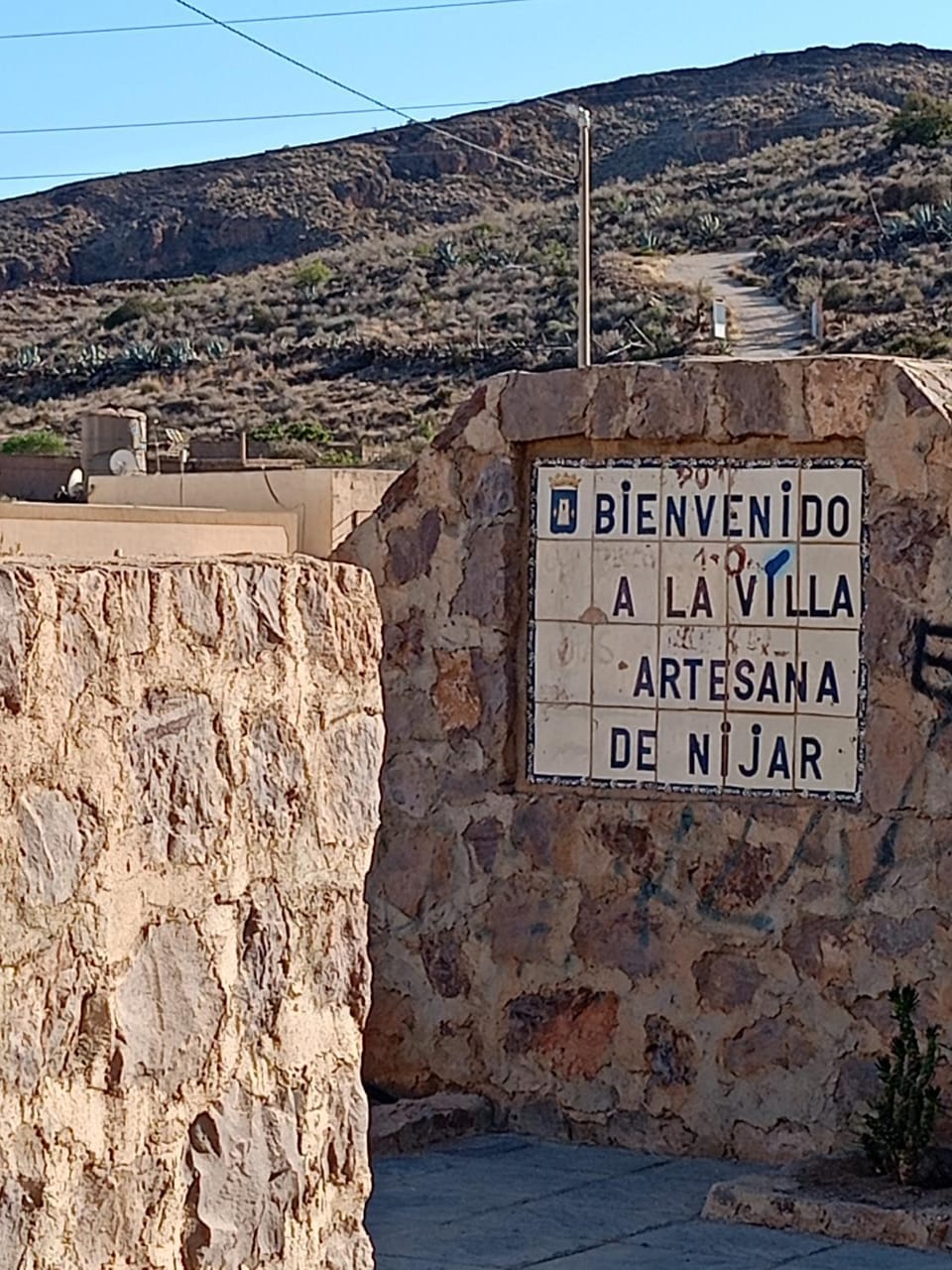Nearby landmark, Day, Neighbourhood, Natural landscape, Text overlay, Mountain view, Street view