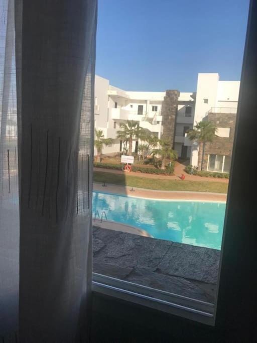 PERLA SAÏDIA APPART XXL Clima IPTV Piscine Parking Jardin Apartment in Morocco