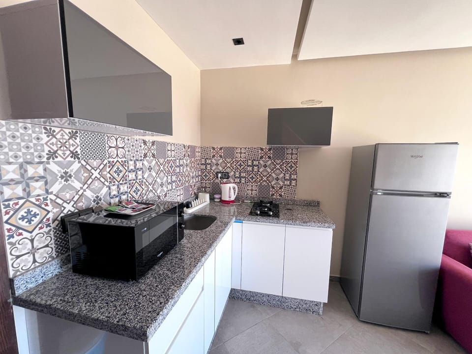 Kitchen or kitchenette, stove