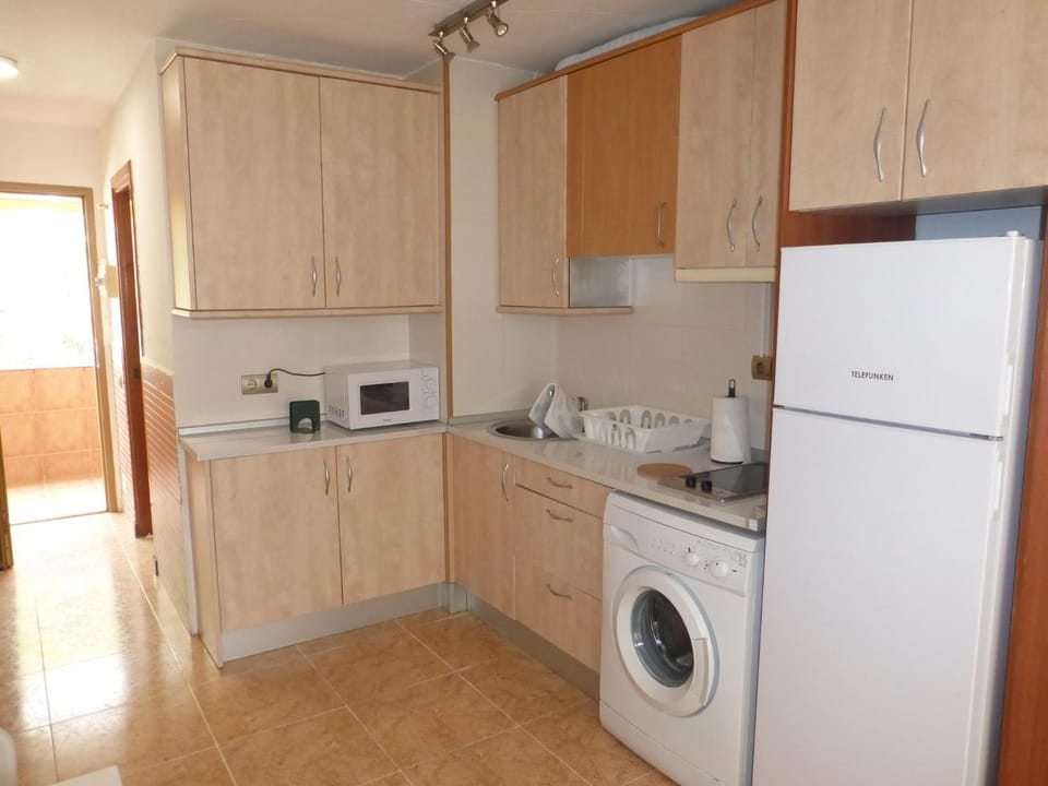 microwave, washing machine, kitchen