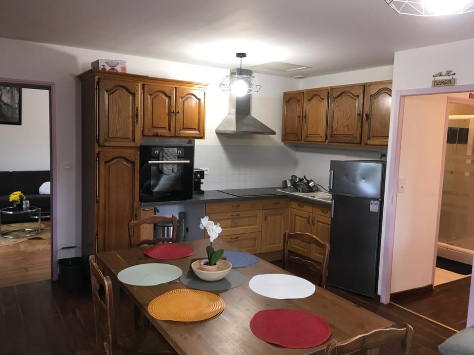 Kitchen or kitchenette, dishwasher, oven, stove