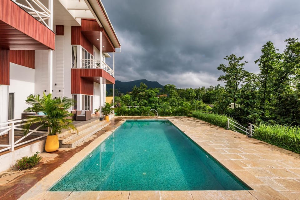 Property building, Natural landscape, Mountain view, Pool view, Swimming pool