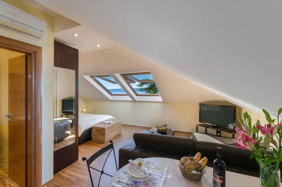 TV and multimedia, Living room, Seating area, Sea view, air conditioner