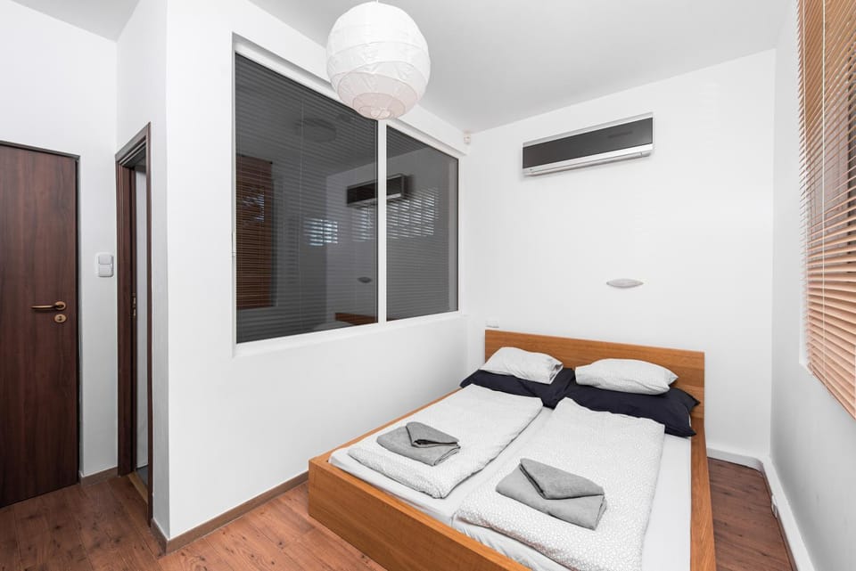 Bed, Bedroom, towels, wardrobe, air conditioner