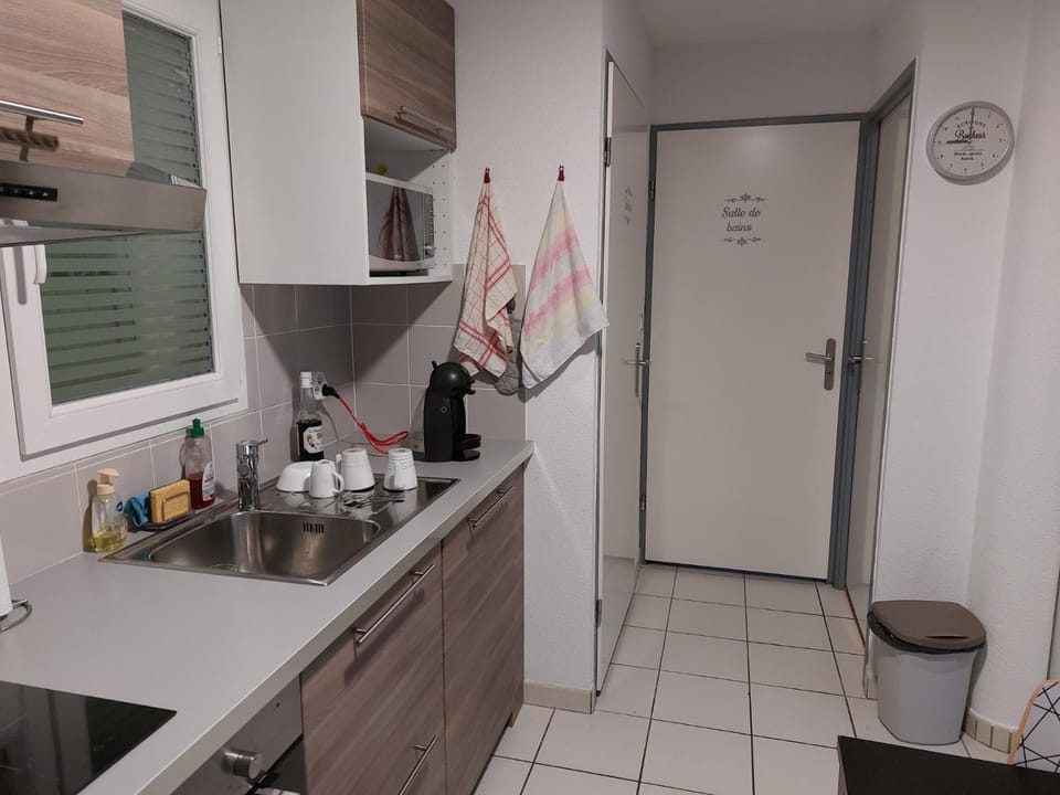 Kitchen or kitchenette, stove