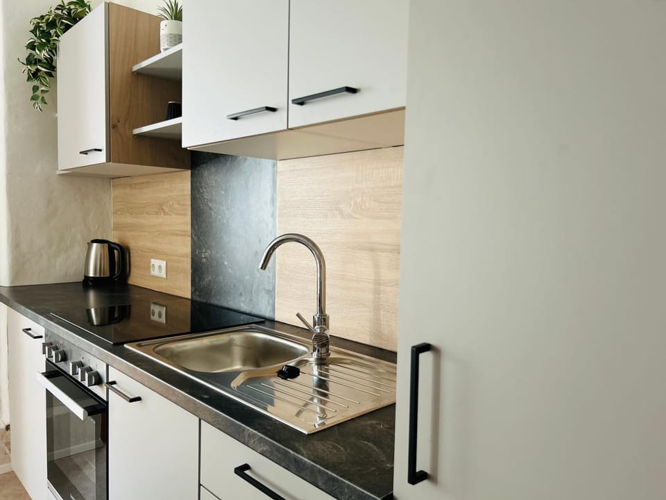 Kitchen or kitchenette, stove