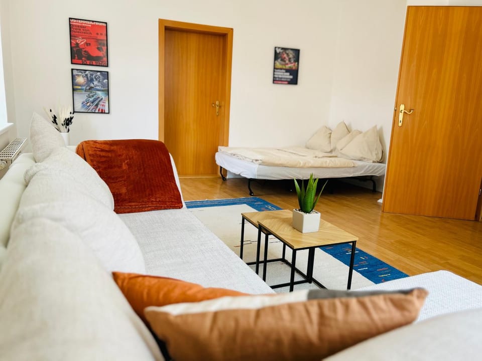 Bed, Living room, Seating area