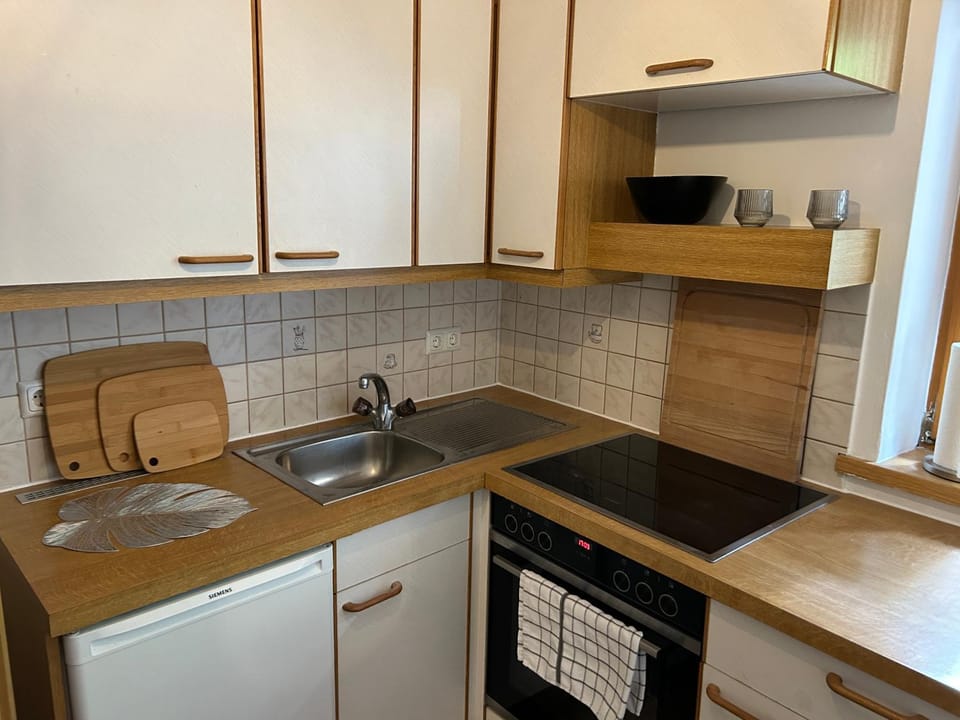Kitchen or kitchenette, stove