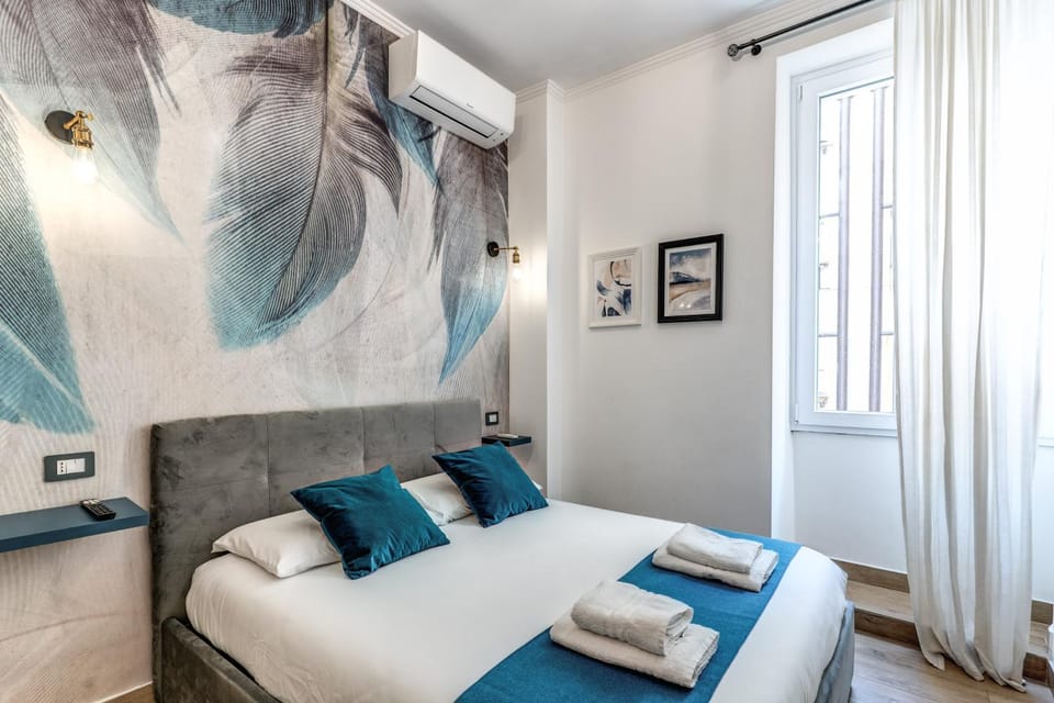 Bed, Photo of the whole room, Bedroom, towels, air conditioner