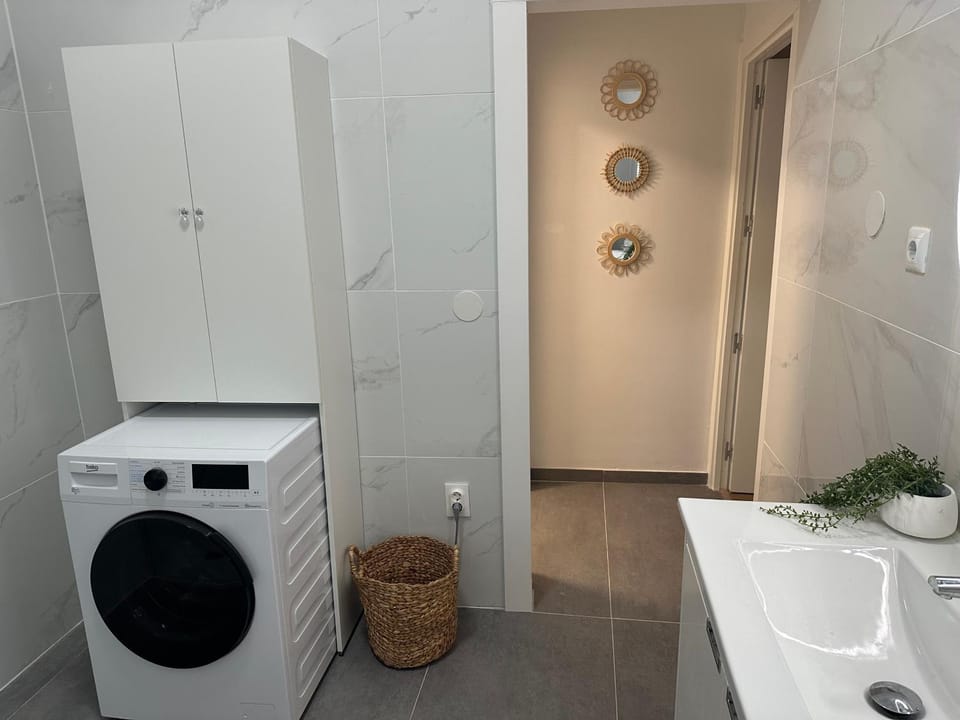 Bathroom, washing machine, dryer