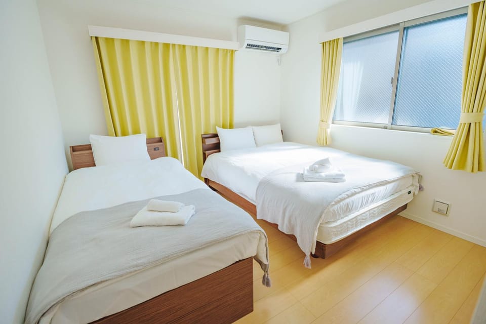Bed, Photo of the whole room, Bedroom, towels, air conditioner