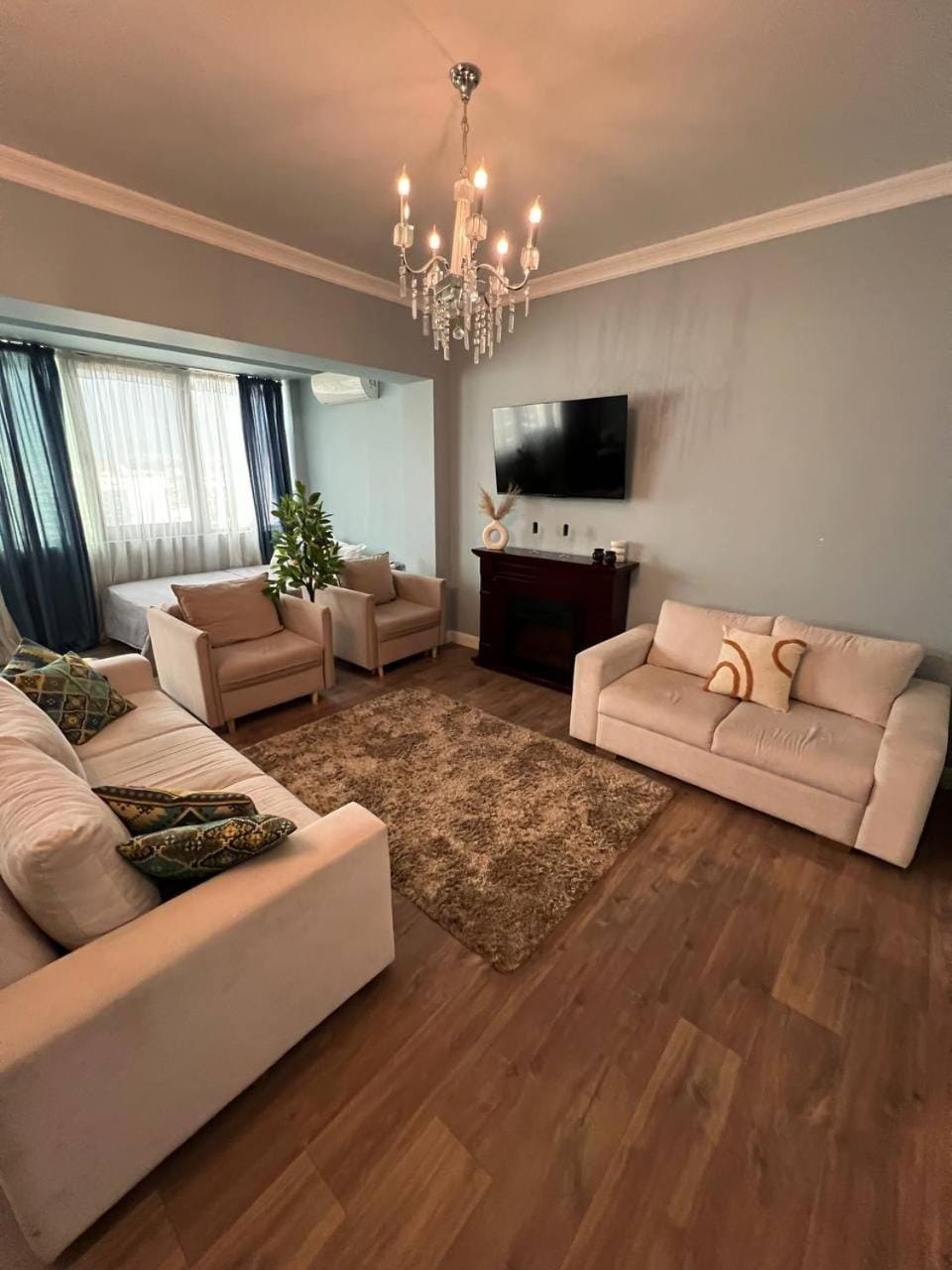 TV and multimedia, Living room, Seating area, fireplace, air conditioner