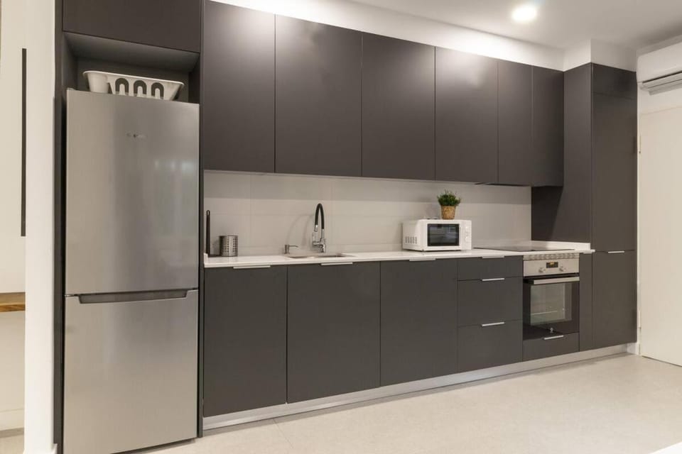 Kitchen or kitchenette, oven, stove