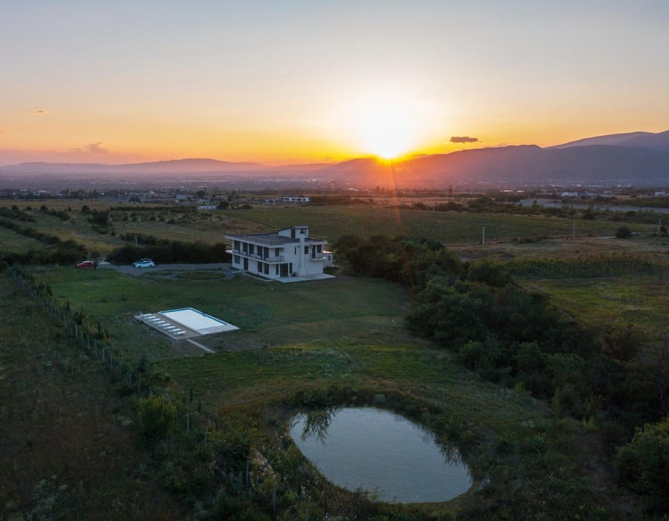 Property building, Natural landscape, Mountain view, Swimming pool, Sunset