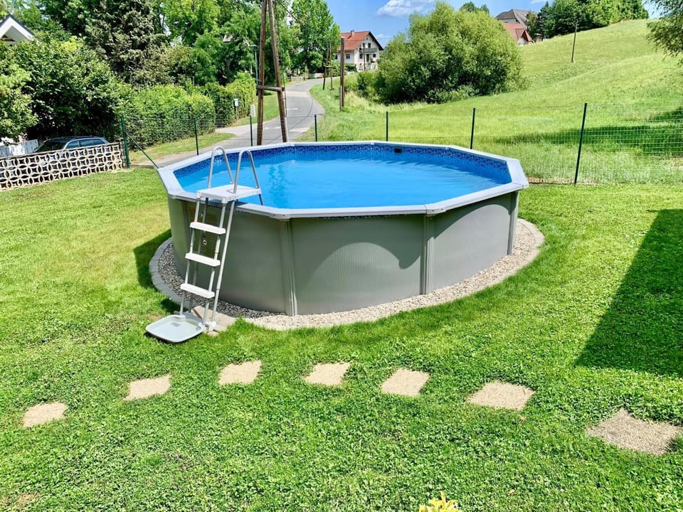 Property building, Living room, Swimming pool
