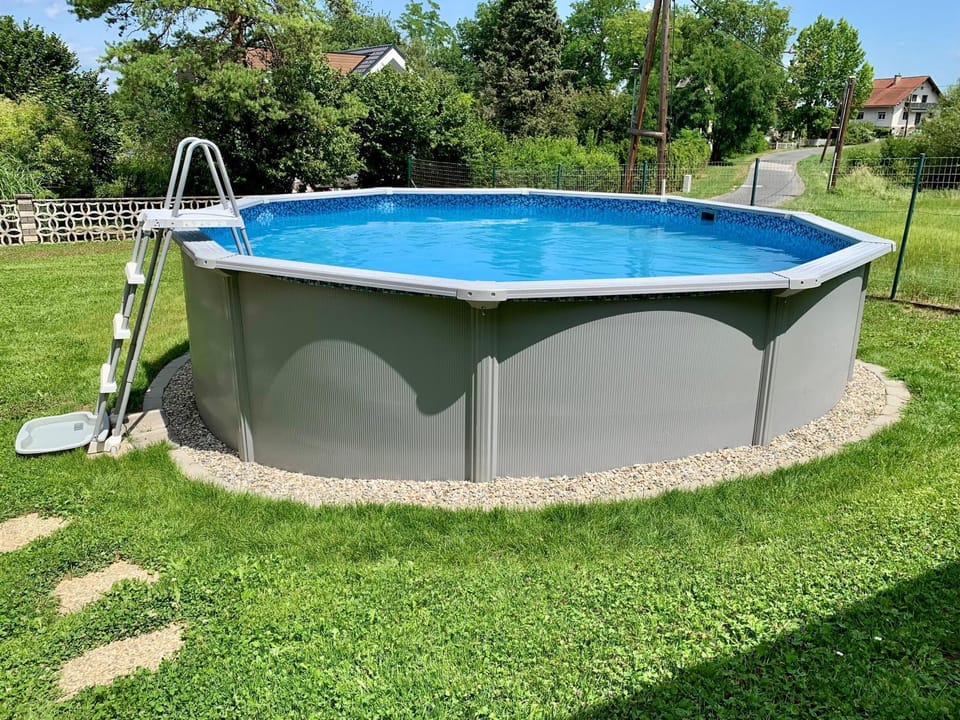 Property building, Living room, Swimming pool